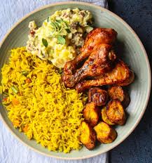Chinese Fried Rice, salad, plantain, and chicken 
